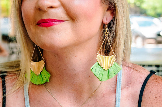 lime green raffia earrings in a triangle shape with trendy gold design and hypoallergenic hooks