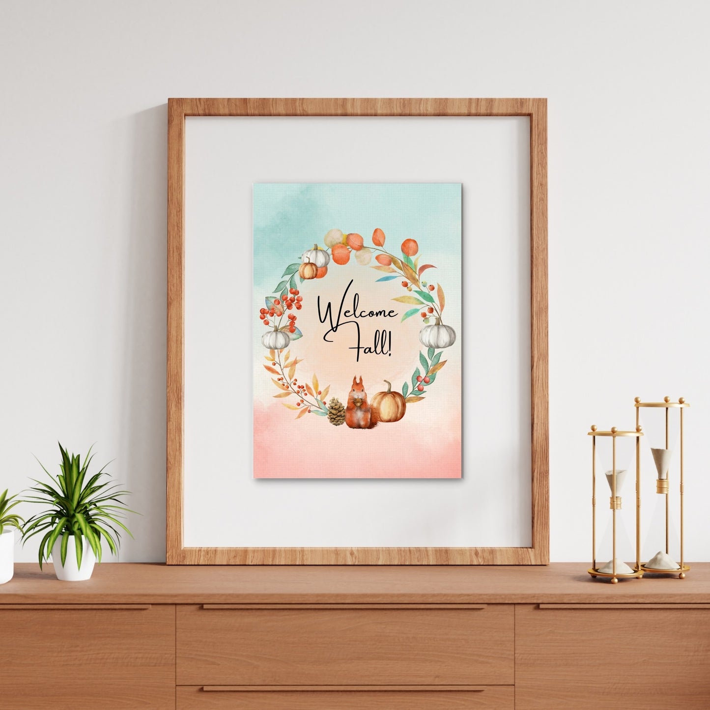 Welcome Fall with Squirrel Pinecone Pumpkin and Fall Leaves and Berries in a Wreath with Mauve and Turquoise background